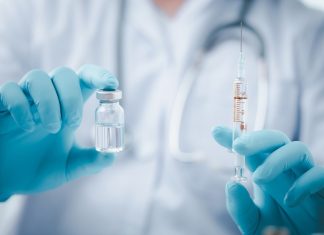 How may the genetic differences observed in the current monkeypox virus outbreak impact immune responses induced by VACV vaccines?